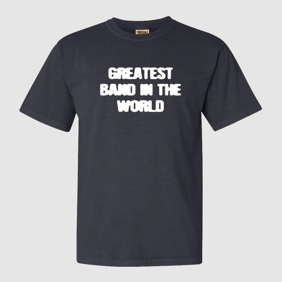 A black tee shirt that reads "Greatest Band in the World".